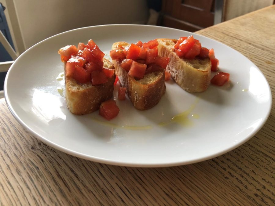 Snack: Bruschetta

REVIEW:

This was a super simple but super delicious appetizer. I used homemade baguettes, which are pretty simple (and you can follow this video: https://www.youtube.com/watch?v=m08i8oXpFB0&t=118s.). 

THINGS TO REMEMBER:

I cut up the baguettes and stuck them in a cast-iron pan with some olive oil for a couple of minutes on each side. I diced some tomatoes, tossed them with some balsamic vinegar and added them to the top of the baguette slices. I drizzled some olive oil, and voila! 

FINAL VERDICT:

These are definitely worth it. Baking the baguettes is definitely worth it — and it’s super easy. You can also do this with store-bought bread, though, and it’ll be nearly as good.
