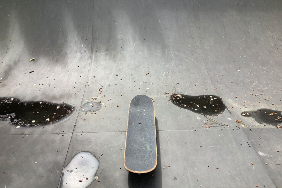 This is a picture of a skateboard that is on a ramp.
