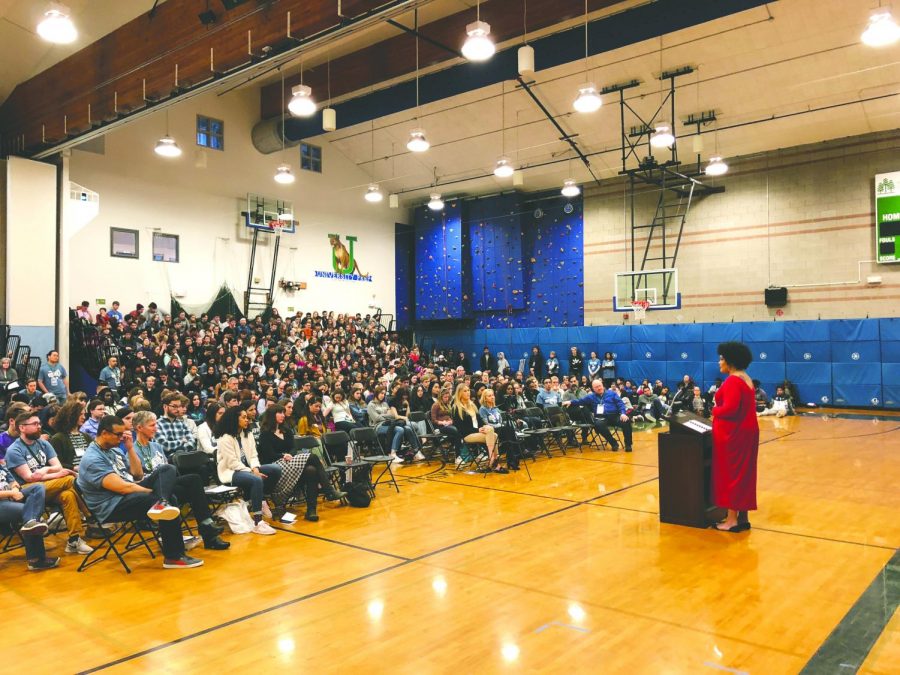Students and faculty  listen to guest speaker Ijeoma Oluo in the Pumadome during Social Justice Day in 2019.