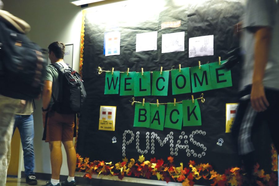Students mill around the welcome back sign in a hallway. This year, University Prep is putting an emphasis on “belonging.” 