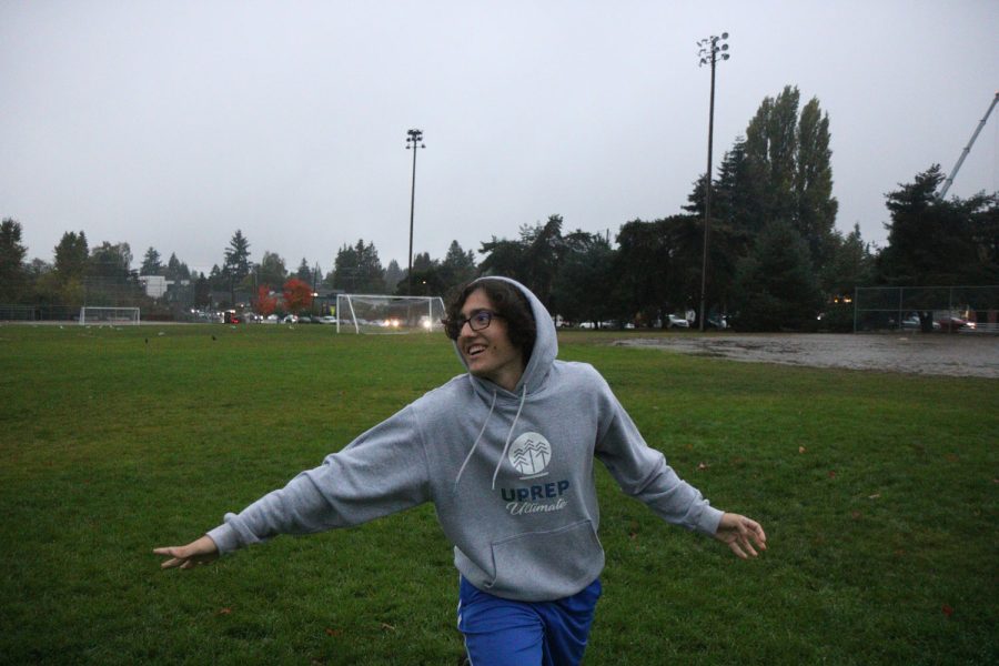 Senior Josh Amador throws a frisbee to his teammate during winter ultimate. “In my experience, mixed ultimate has had by far the most inclusive and kindest people I’ve ever played with across any sport,” Amador said.