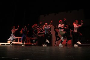 Members of the dance class perform "Thriller" at the sophomore and senior Halloween assembly.