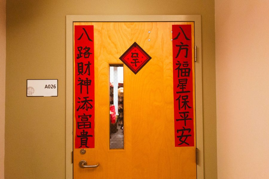 Decorations for the Lunar New Year are hung outside the door to the Chinese classroom.