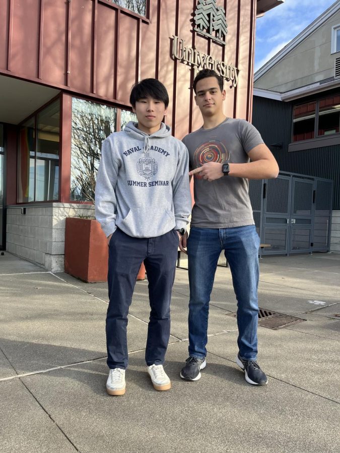 Seniors Joshua Yi and Diego Rubiralta pose in front of UPrep. with Yi wearing a Naval Academy sweatshirt. Rubiralta is set to attend the Academy in the Fall while Yi is still weighing his options.