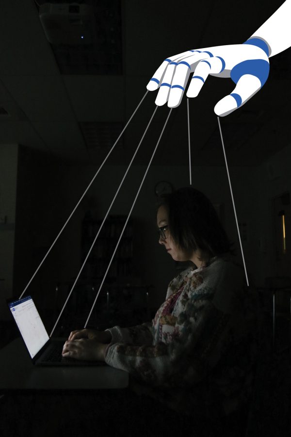 A robotic hand, which symbolizes artificial intelligence, puppeteers a student writing an essay to illustrate the potential power of tools like ChatGPT. Graphic: Sydney Goitia-Doran