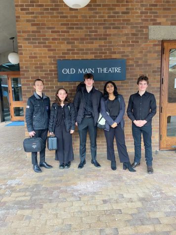 Max Bolen, Laura Capossela, Quin Drabek, Komathi Anand, and Chancellor Avolio stand infront of the Old Main Theatre at Western Washington University