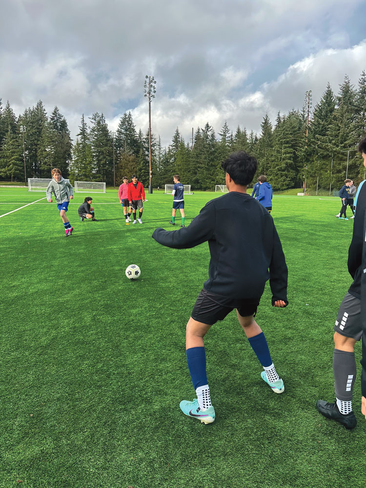 
“They’re very high energy practices, high intensity,” Zinedine Smith, a center midfielder on the boys varsity soccer team, said.
