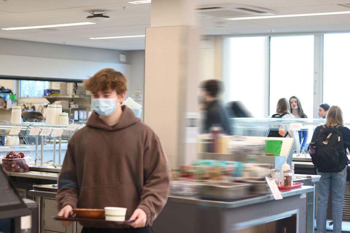 This image depicts the difference between school life during COVID and now. A brief return to online school reminded librarian Anne Bingham of what it was like during the pandemic. “The snow day makes you realize you hope we don’t ever go through that again,” Bingham said.

Photo: Sol Starin, Grady Stone