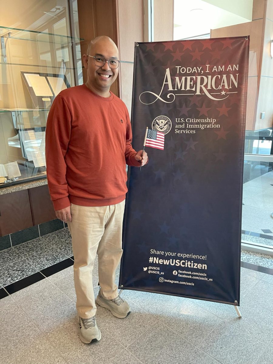 Russel Cuya posing at his Naturalization ceremony.