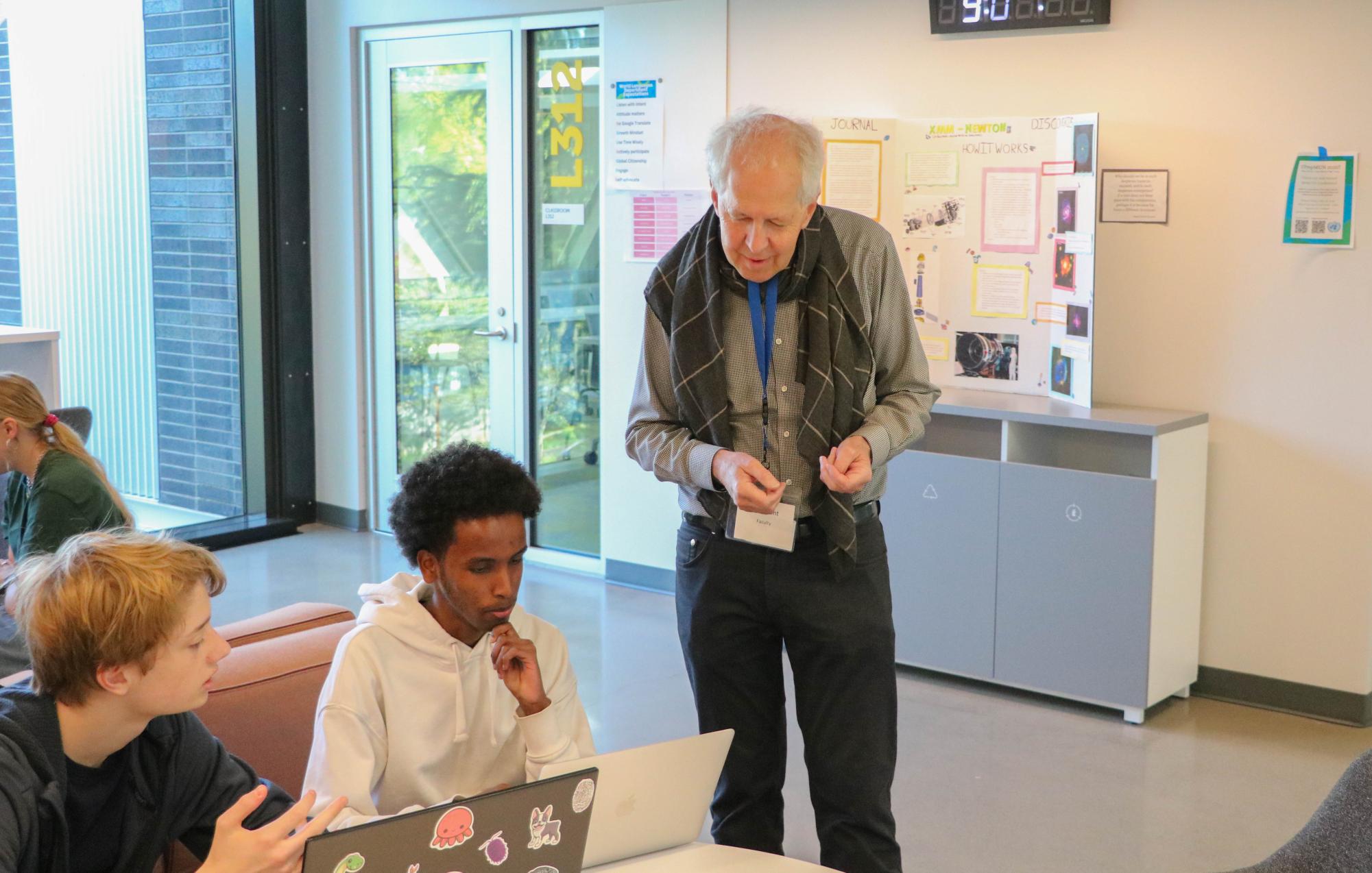 Pat Grant gives guidance to students in his US history class. “I enjoy helping students learn about what has happened in our past and what is happening today,” Grant said.