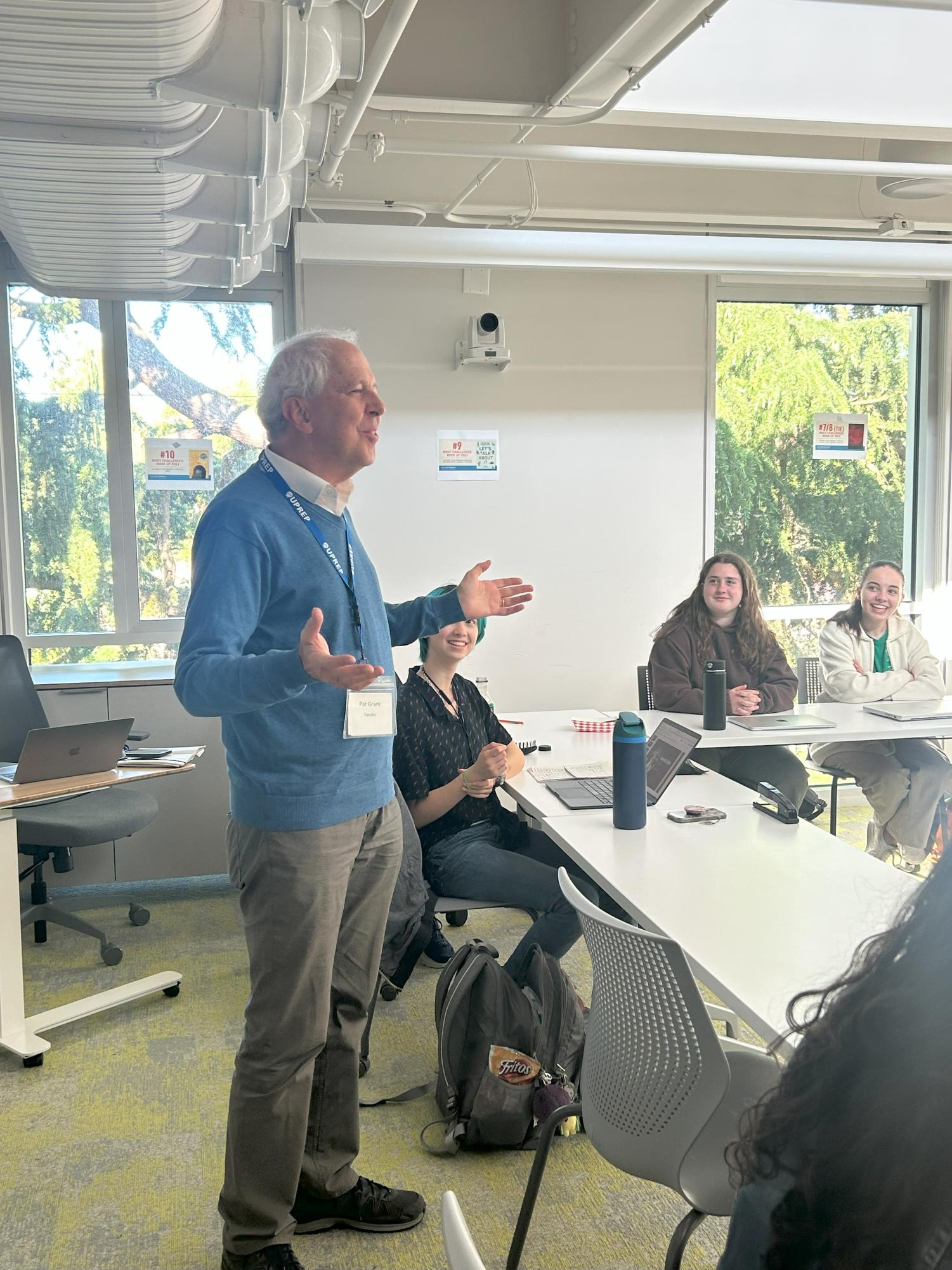 Upper school history teacher Pat Grant teaches a junior U.S. history class. Grant also teaches the macroeconomics and microeconomics classes at UPrep.