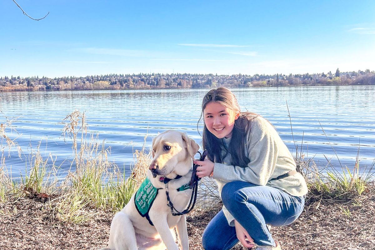 Zoe Glass and her dog, Filmore, on the day of his recall, March 17, 2024, at Green Lake.