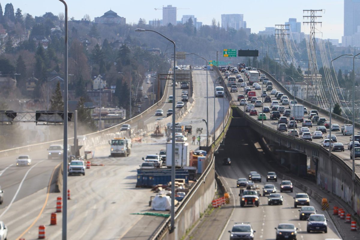 Construction along the northbound lanes of I-5 amid afternoon traffic. “You can expect delays during periods of construction on the Ship Canal Bridge,” said the Washington State Department of Transportation website. “Plan ahead and give yourself extra time to travel.”